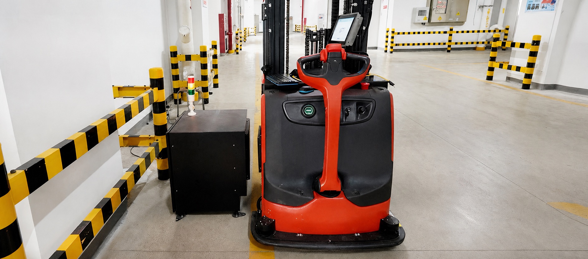 Industrial vehicle aligned beside a wireless charging station
